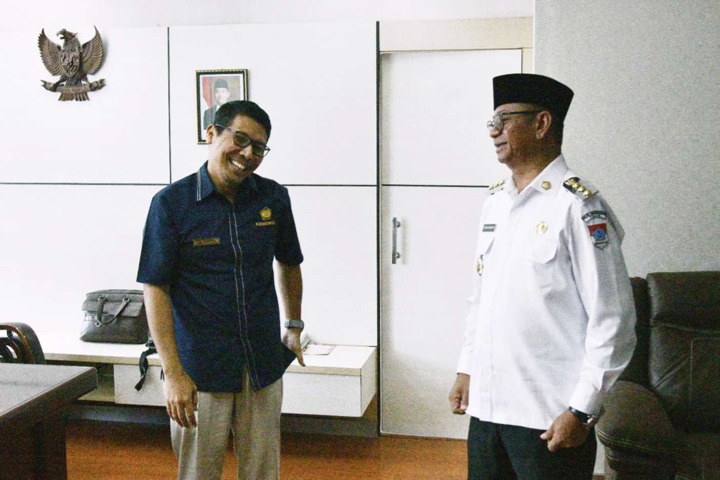 Bupati Boltim Oskar Manoppo Temui Kepala KPKNL Manado Adi Suranto Bahas Aset Daerah