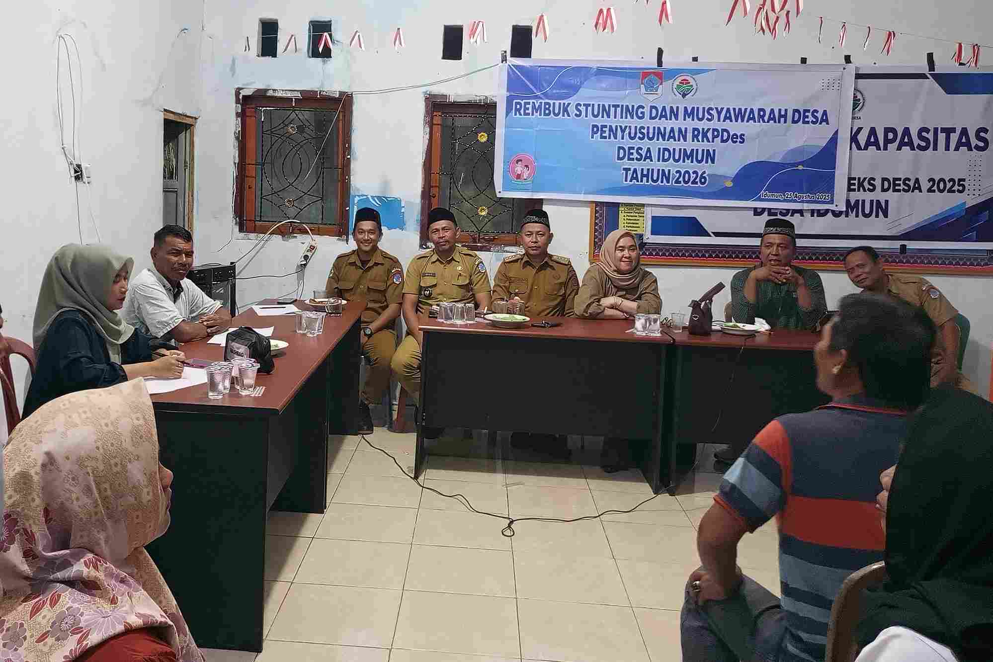 TA Bupati Boltim Hamka Pontoh saat rembuk stunting Desa Idumun