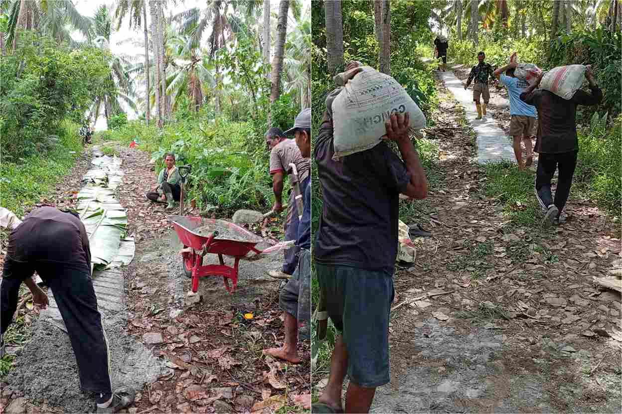 warga Desa Loyow bergotong royong mengecor jalan kebun