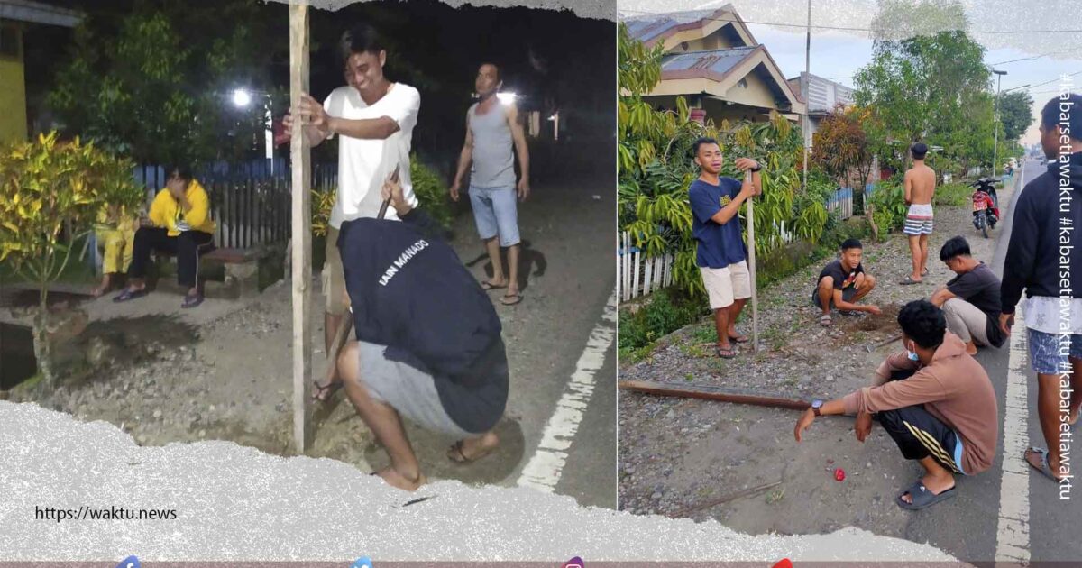 Pemuda Boltim Pasang Lampu Hias