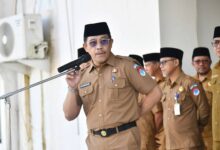 Sekda Boltim Iksan Pangalima menyampaikan DAU Boltim Februari 2026 bebas sangsi