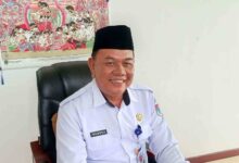 Asisten Bidang Pemerintahan dan Kesejahteraan Rakyat Sekretariat Daerah (Setda) Pemkab Boltim, Hendra Tangel memberikan penjelasan terkait pergantian Sangadi Modayag III