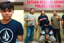 Tim Resmob Polres Boltim mengamankan terduga pelaku penikaman dua pemuda di Desa Molobog.